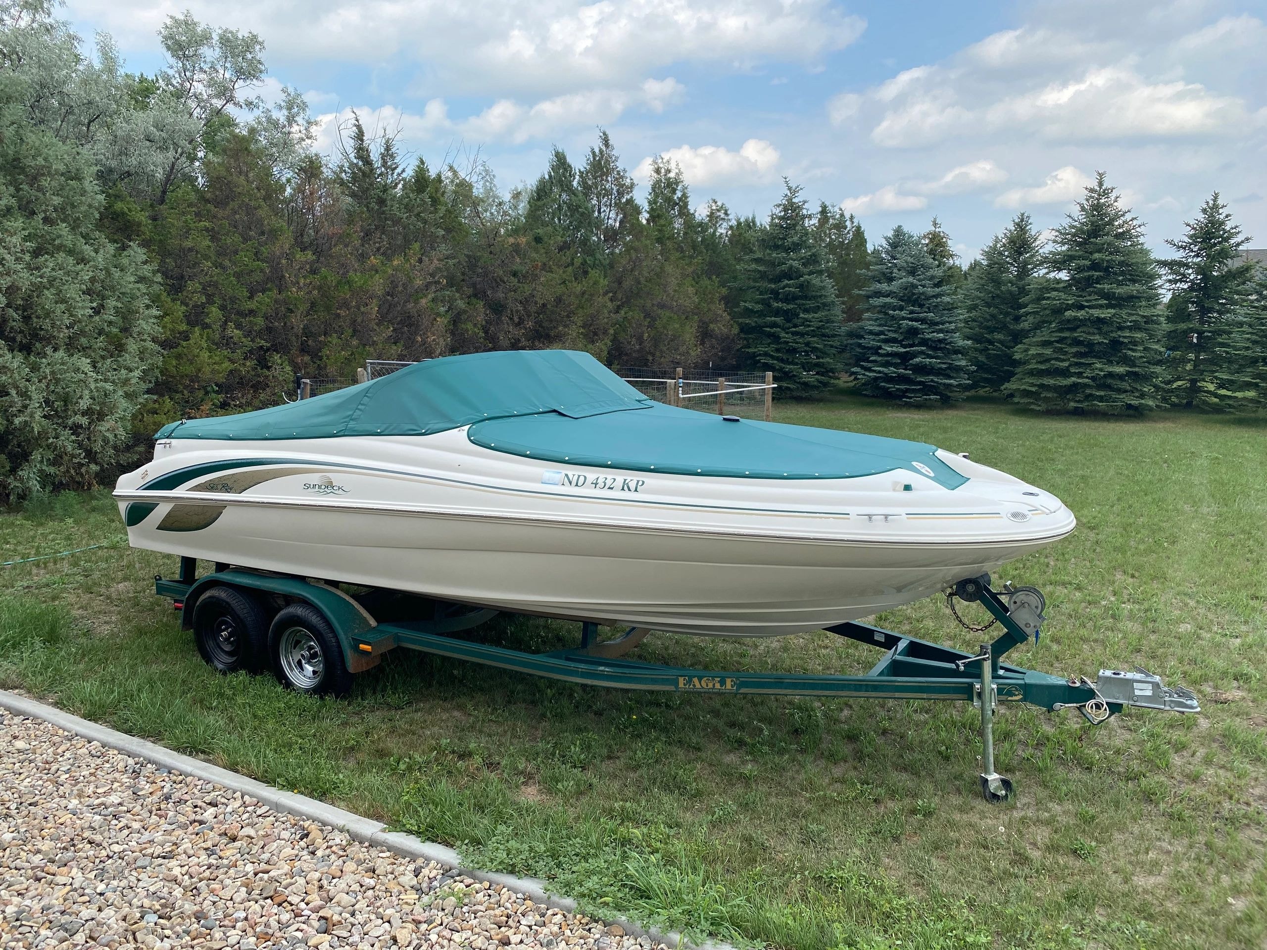 Boat on water with custom canvas